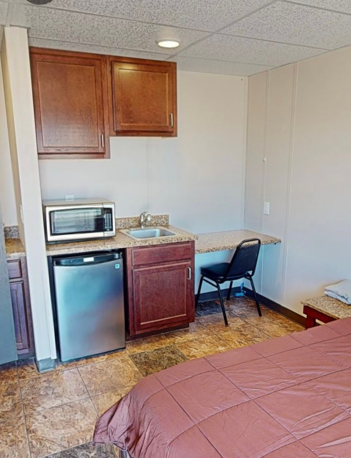 Kitchenette with mini fridge and microwave